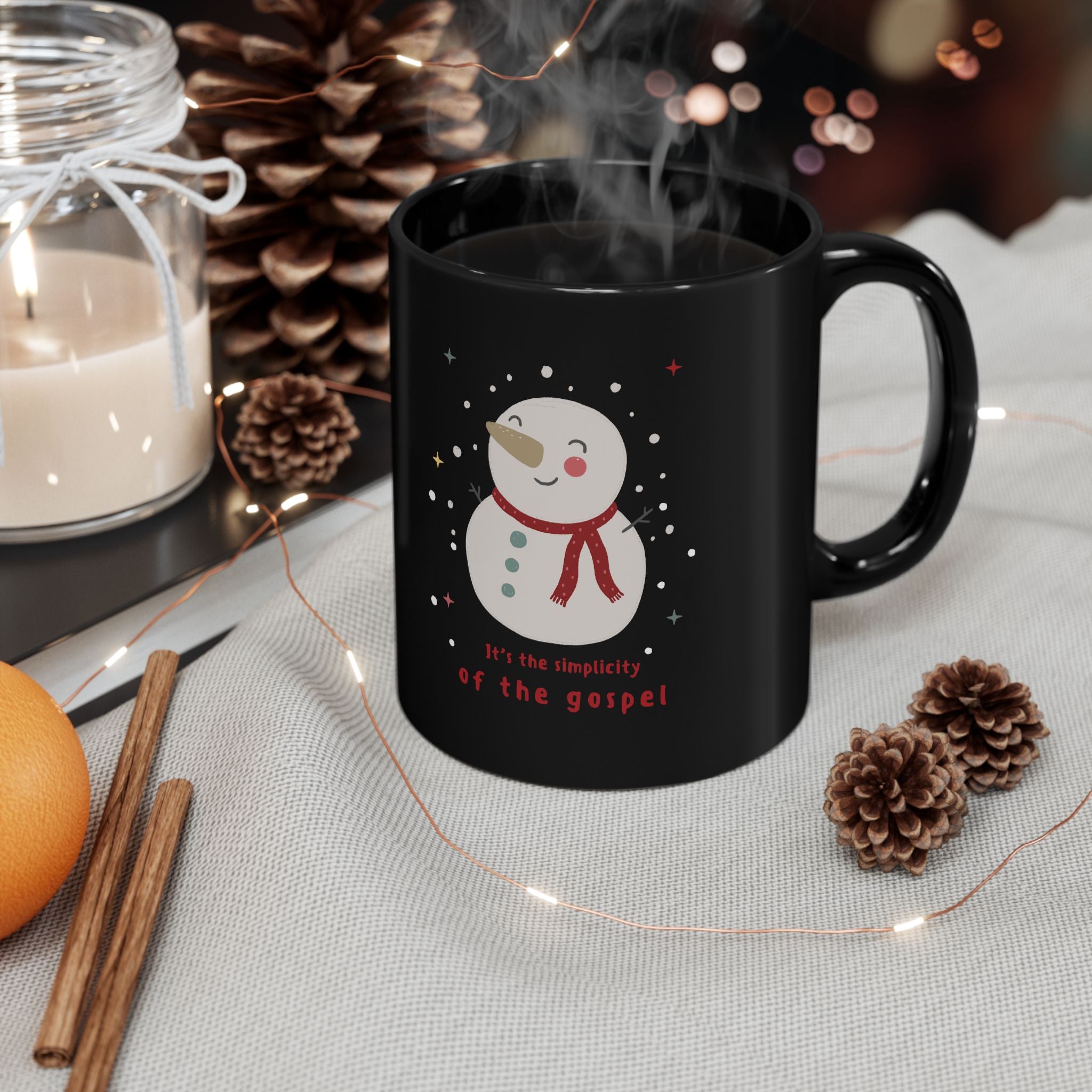 Christmas Snowman Mug — "It's the Simplicity of the Gospel" Black Ceramic Coffee Cup